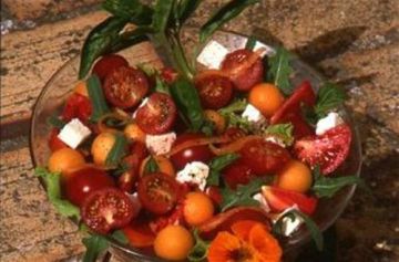Melon en salade aux tomates cerises Melon en salade aux tomates cerises