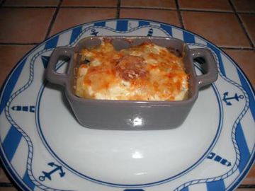 Gratin de pommes de terre au beaufort et à la saucisse de Morteau Gratin de pommes de terre au beaufort et à la saucisse de Morteau