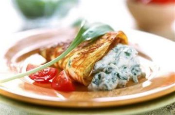 Omelette au fromage blanc à l'ail et aux pousses d'épinard Omelette au fromage blanc à l'ail et aux pousses d'épinard