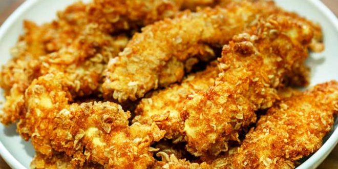 Escalopes de poulet panées aux corn flakes et cacahuètes Escalopes de poulet panées aux corn flakes et cacahuètes