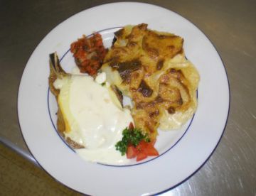 Côtes de porc au reblochon, gratin dauphinois Côtes de porc au reblochon, gratin dauphinois