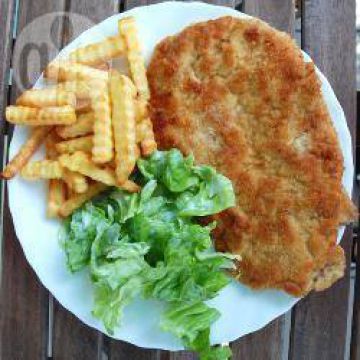 Côtes de porc panées à la polonaise Côtes de porc panées à la polonaise