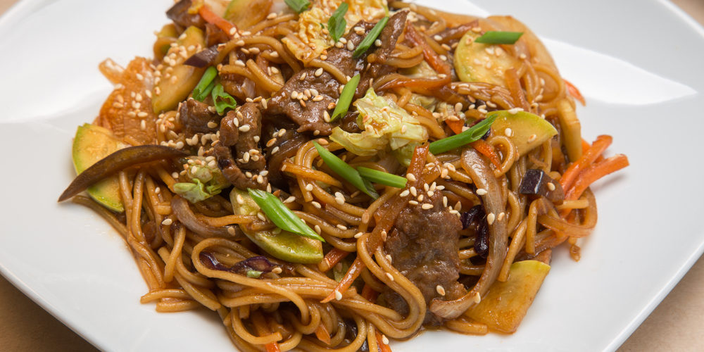 Wok de nouilles sautées au porc Wok de nouilles sautées au porc